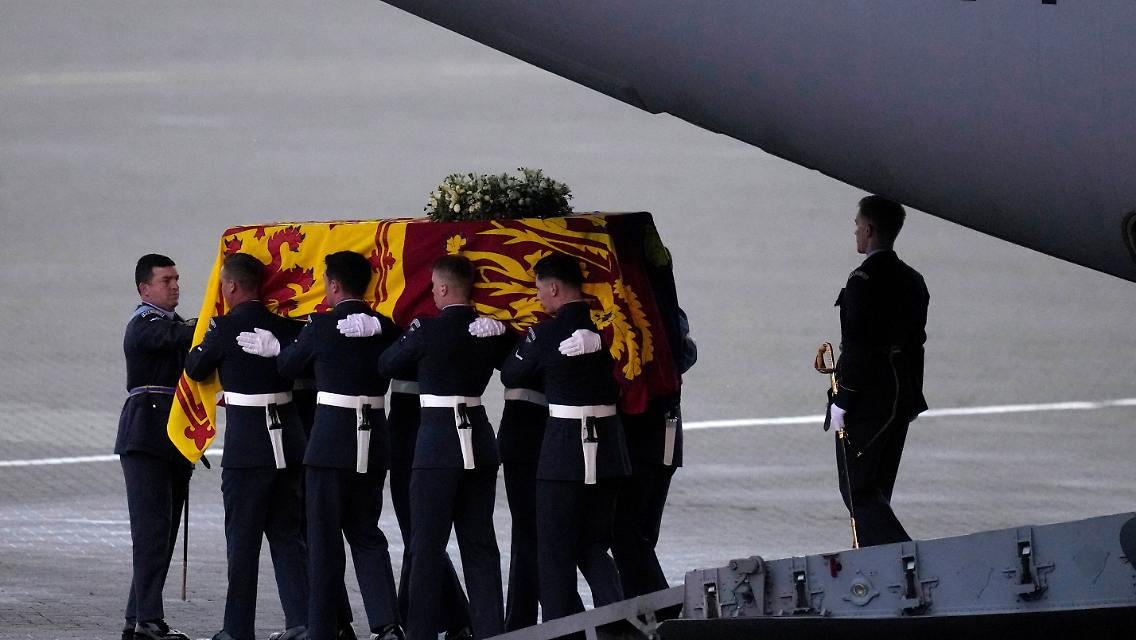 The Queen's coffin is taken out of the plane at Northolt Air Force Base.