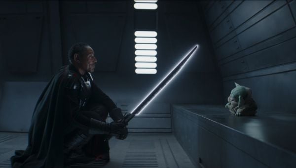 Moff Gideon with DarkSaber in The Mandalorian atop Grogu